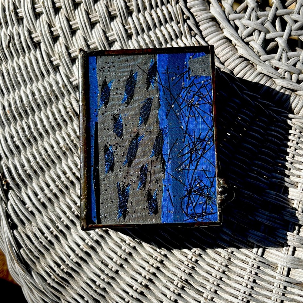 Dichroic glass faced box